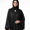 Black abaya with embroidered detailing.