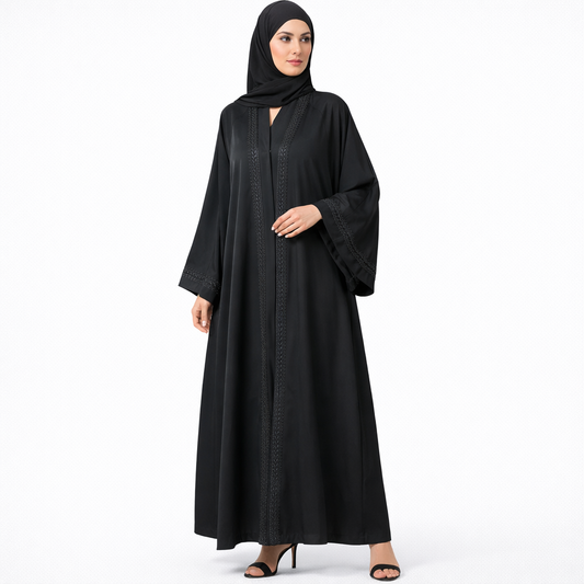 Black abaya with embroidered detailing.